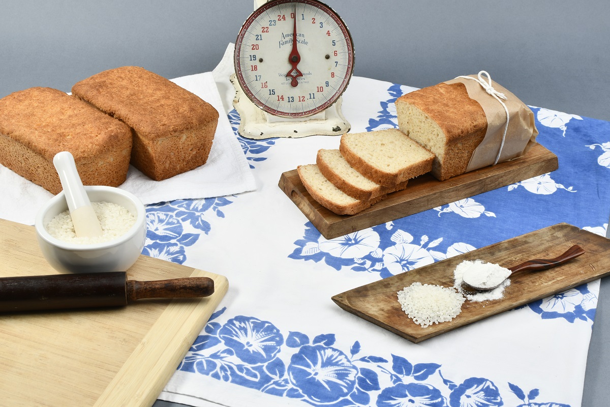 A table with bread and milk on it